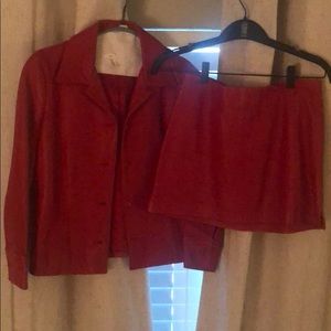 Red leather jacket and mini skirt